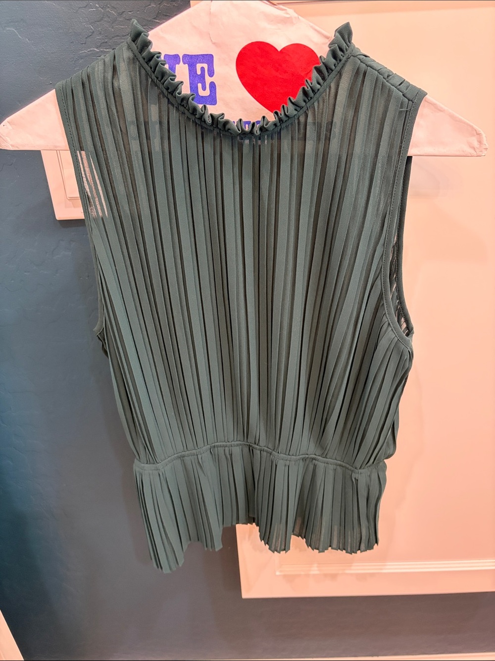 Naked Zebra Hunter green sleeveless peplum top